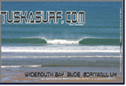 Photo of surf and surfing tubing wave at Widemouth Bay Bude Cornwall UK