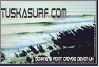photo of surf and surfing wave set wrapping around downend point devon england