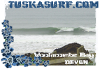 Surf T shirt with Photo of surf and surfing barrelling wave at Woolacombe bay devon england