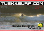 Photo of surf and surfing tubing wave at Caswell Bay Gower Wales UK
