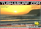 Photo of surf and surfing tubing wave at Caswell Bay Gower Wales UK