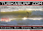 Photo of surf and surfing tubing wave at Caswell Bay Gower Wales UK
